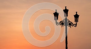 Background image of retro lamp in sunset