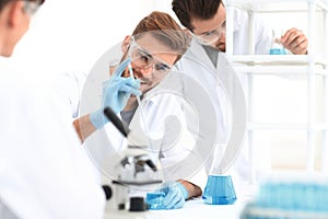 Background image science team in the lab