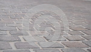 Background image of set of granite Grey brick stone street road. Light sidewalk, pavement texture