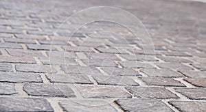 Background image of set of granite Grey brick stone street road. Light sidewalk, pavement texture