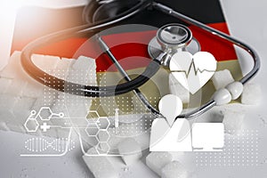 Background image of sugar cubes with medical stethoscope and healthcare in Germany