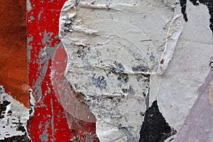 Background image of textures of torn and peeling poster paper