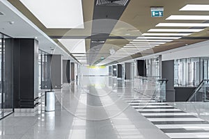 background inside of modern administrative building or airport. indoor large corridor, hall. Inner passageway in office