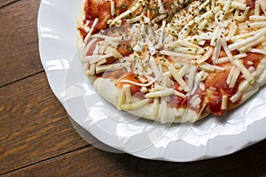 Background of Instant pizza cheese and ketchup over origano on w