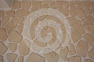 . Background of irregular bricks used to decorate a wall. Tiles for coating photo