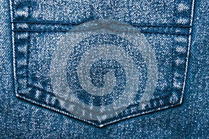 Background jeans, blue denim texture fabric with a seam of fashionable design. Empty pattern copy space