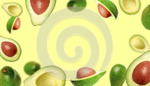 Background of juicy ripe avocados. Levitating avocados on a light background