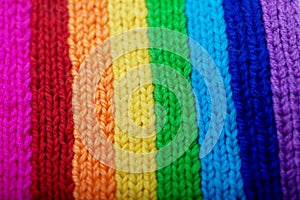 Background from knitted rainbow. texture of wool products. Ð¡omfortable home background.