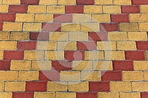background of laid street parquet in yellow and red