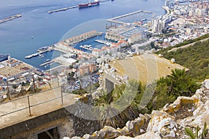 Background landscape view of the ruined city at the bottom with the Rock of Gibraltar