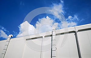 Background large ventilation chimney in bright blue day and empty top space for text
