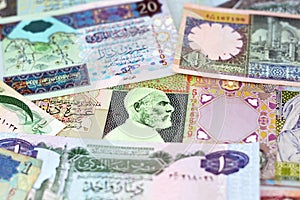 Background of Libyan money dinars banknotes with portraits of Omar Al-Mukhtar on some banknotes
