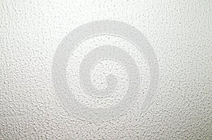 Background lighted white rough wall