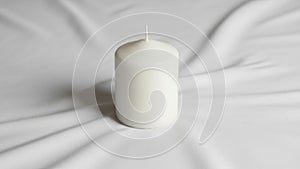 The background and the lighting highlights the candle s simplicity