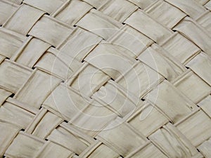 background macro image of a light wicker surface made of natural material