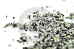 A background made out of strewn inside an activated carbon filter and water filter balls, isolated on a white background, selectiv