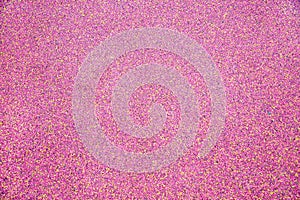 The background is made of rubberized coating used on children\'s and sports grounds in pink.