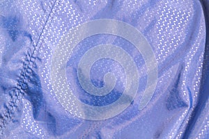 Background made of synthetic blue material.close up