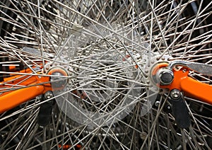 background of many bicycle spokes