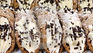 Background of many pastry items called Sicilian Cannoli