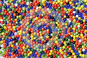 Background of many small, colorful glass beads