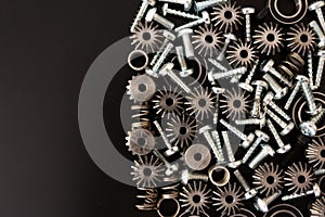 Mechanical components on black background. Industrial objects