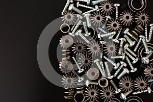Mechanical components on black background. Industrial objects