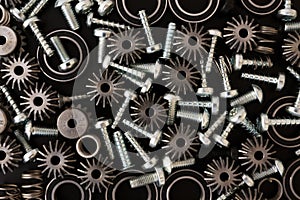 Mechanical components on black background. Industrial objects