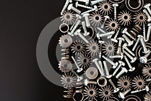 Mechanical components on black background. Industrial objects