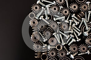 Mechanical components on black background. Industrial objects