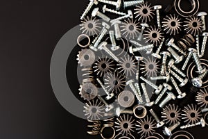 Mechanical components on black background. Industrial objects