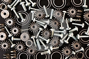 Mechanical components on black background. Industrial objects