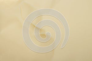 Background of melted cream cheese.Melted cream cheese.