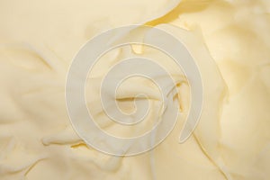 Background of melted cream cheese.Melted cream cheese.