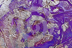 Background with metal oxidation effect. blending shades of purple and silver