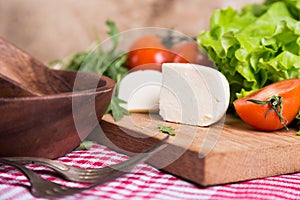 Background from mixed vegetables with wood board