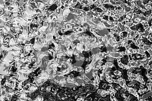 Background of molten metal, liquid steel close-up. Liquid metal texture