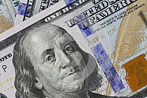 Background of money. Macro shot of a new 100 dollar bill.