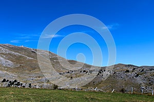 In the background, mountain desolation, with little vegetation. On the way to the mountain Bjelasnica