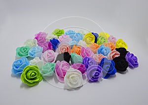 Background of multicolored artificial roses