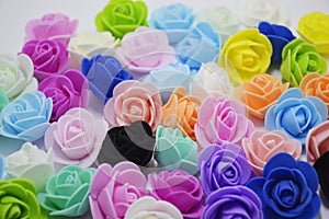 background of multicolored artificial roses