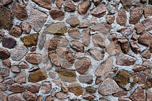 Background - multicolored gravel pebble dash on the wall