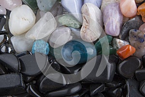 Background from multicolored polished stones background