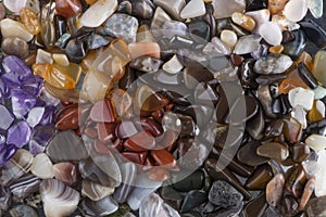 Background from multicolored polished stones background