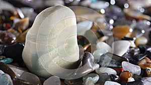 background from multicolored polished stones background texure close up