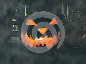 Background for the mystical holiday Halloween. Religious beliefs. Jack-o`-lantern pumpkin decorative lantern