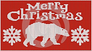 Background for the New Year mood. Merry Christmas. Knitted picture. Pullover. Bear and snowflakes. Creates heat.