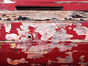 Background of Old abandoned wodden traditional fishing boat. Ancient Rusty Ship Board of old and colored boat wooden hull past