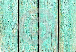 Background from old boards with peeling green paint