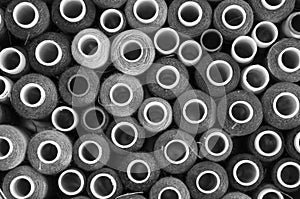 Background of old coils with threads in black and white